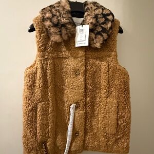 Coach x JLo Shearling Collar Sherpa Chain Signature Vest